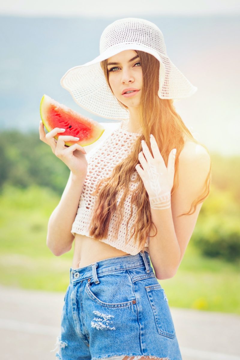 Woman Wearing Floppy Hat