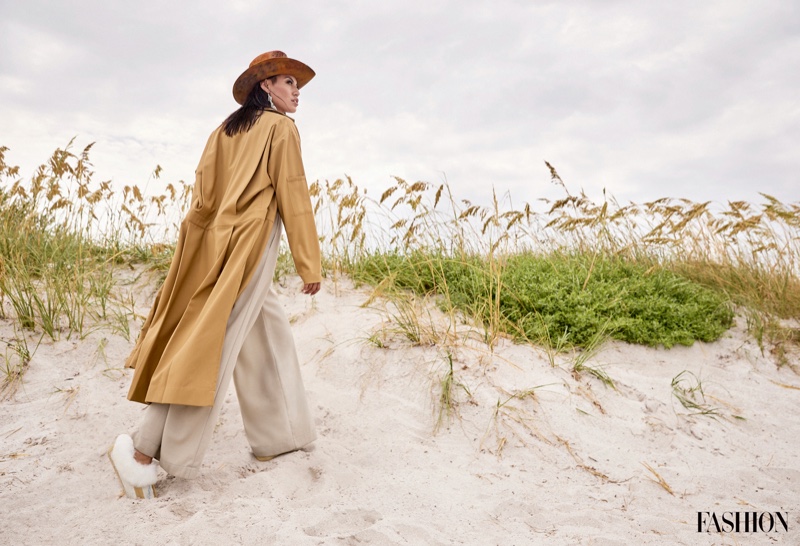 Ashley Callingbull wears Evan Ducharme coat and pants with Manitobah shoes and 4kinship hat. Photo: Gabor Jurina / FASHION