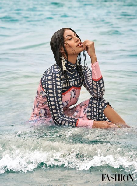 Ashley Callingbull Takes the Spotlight for FASHION Magazine Posing in water, Ashley Callingbull wears Lauren Good Day dress and Indi City earrings. Photo: Gabor Jurina / FASHION