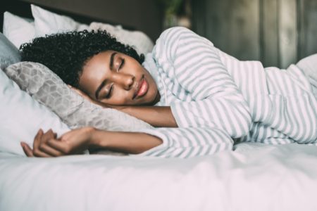 Six Sure-Fires Ways to Obtain a Sound Night of Sleep Beautiful Black Woman Sleeping Striped Top