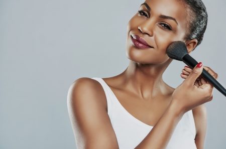 Cosmetics Ingredients: The Good and The Bad Black Model Applying Makeup Brush Beauty