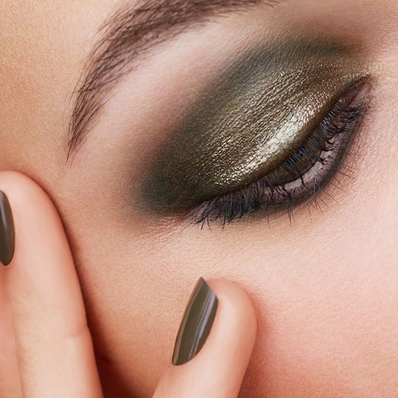 Shimmering green eyeshadow and nail polish stands out in Chanel Makeup's fall 2021 collection.