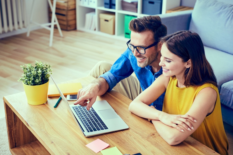 Couple Looking Laptop