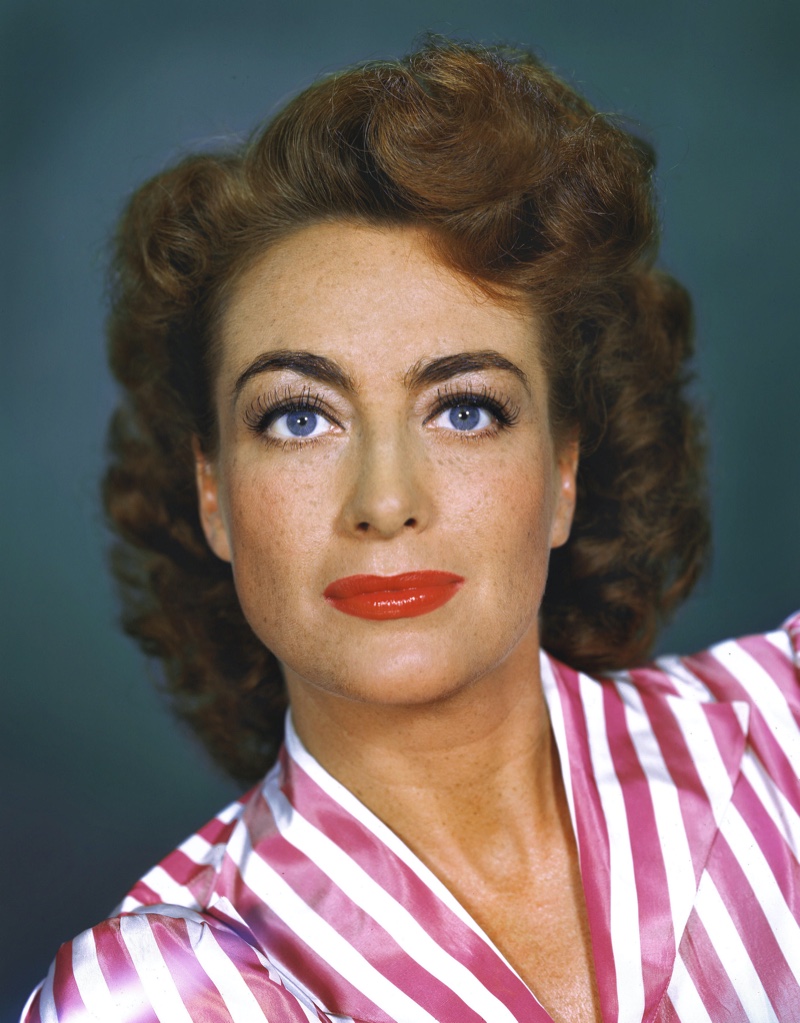 Joan Crawford shows off bold curls in the 1940s. Photo: PictureLux / The Hollywood Archive / Alamy Stock Photo