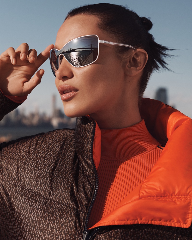 Bella Hadid wears sunglasses in MICHAEL Michael Kors fall-winter 2021 campaign.