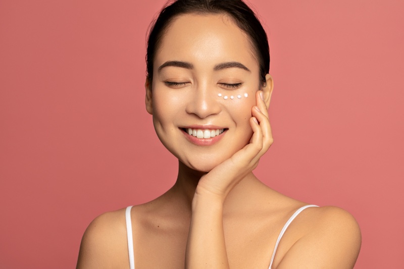 Smiling Asian Model Skincare Moisturizer Face