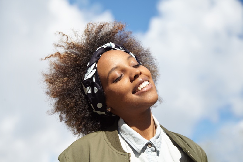 Smiling Black Woman Outside Headband Natural Hair