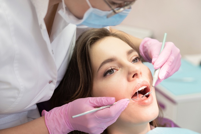 Woman Dentist Office Teeth Work On