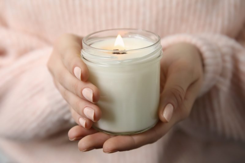 Woman Holding Candle