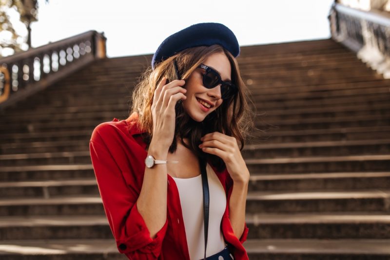 Woman Wearing Red Shirt and Beret