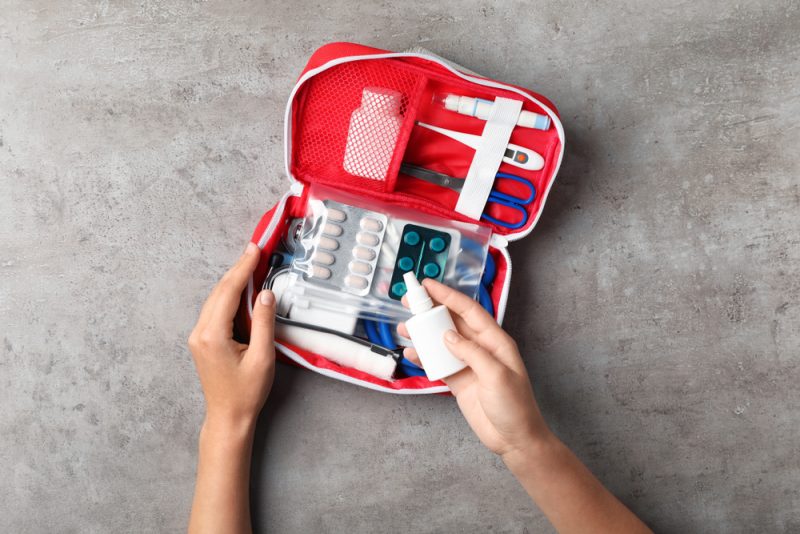 Woman with First Aid Kit