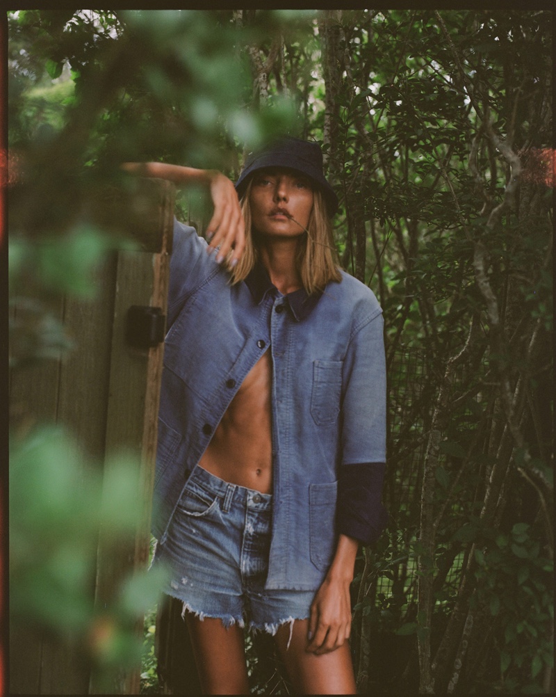 Vintage Coat, Levi’s Shorts, and Pretty Green Hat. Photo: Conrad Dornan