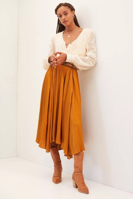 Layer Up in Anthropologie's Fall Skirts Anthropologie Sleek A-Line Midi Skirt in Gold $120
