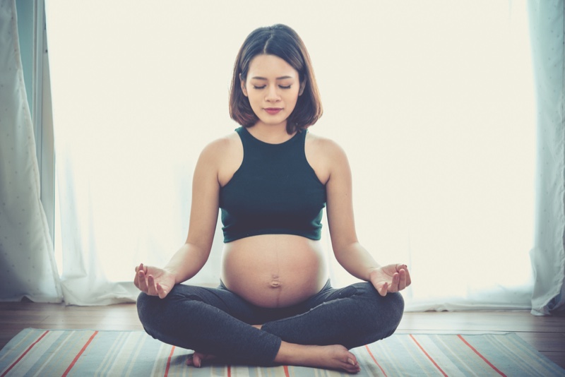 Asian Pregnant Woman Meditation-Yoga