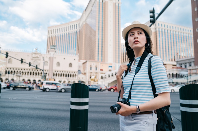 Asian Woman Camera Las Vegas Street Striped Top Hat