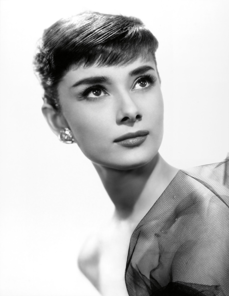 Audrey Hepburn wears a pixie haircut in the 1950s for Sabrina promo shoot.  Photo Credit: Paramount Pictures / Album / Alamy Stock Photo