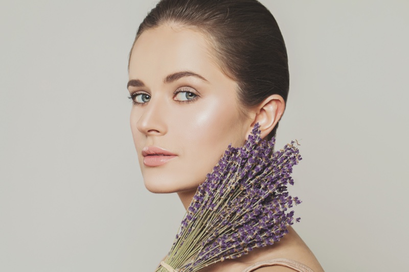 Beauty Woman Holding Lavender