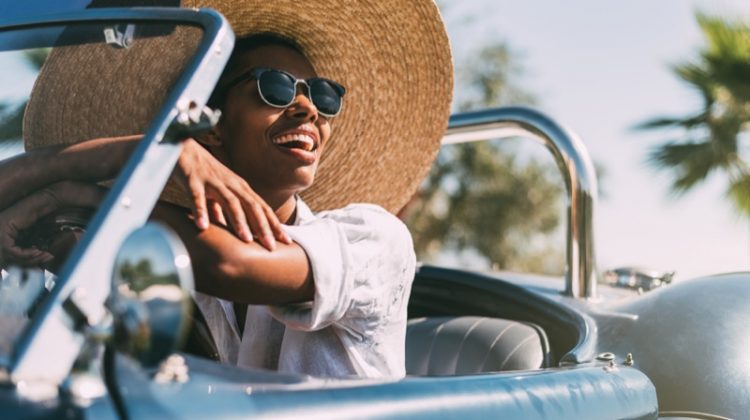 Black Woman Driving Convertible Car Sun Hat