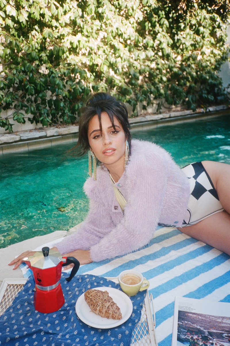 Posing poolside, Camila Cabello wears Versace and Self-Portrait. Photo: Max Montgomery for Hunger Magazine