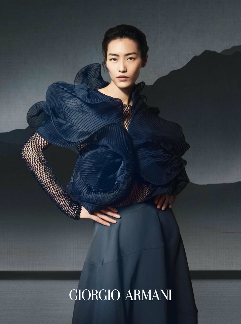 Wearing a sculptural look, Liu Wen poses for Giorgio Armani fall-winter 2021 campaign.