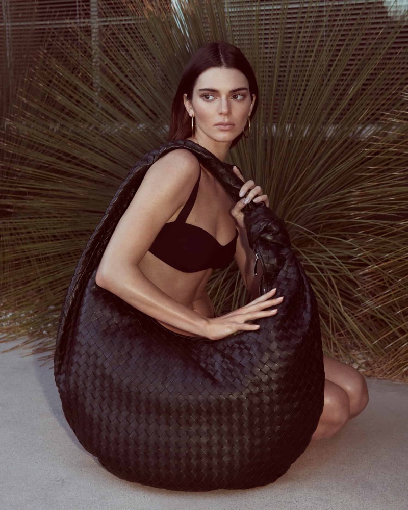 Posing with an oversized bag, Kendall Jenner fronts FWRD shoot.