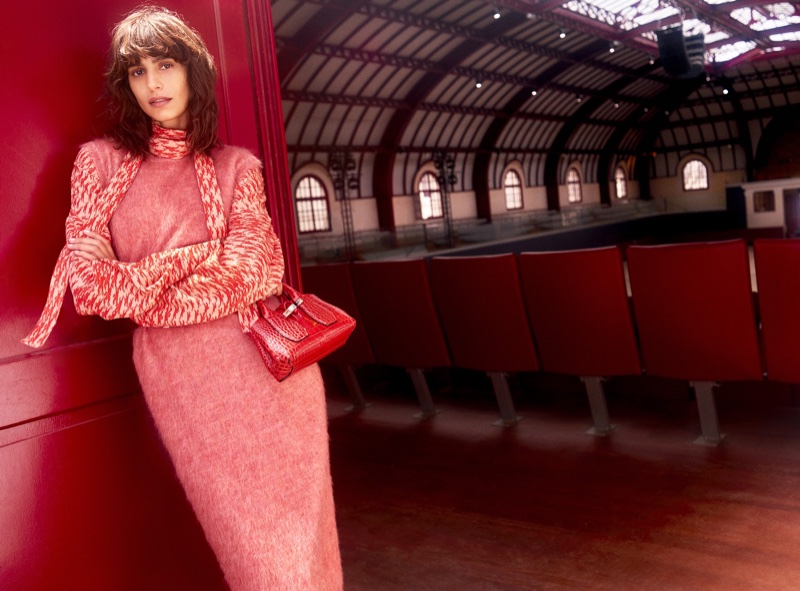 Dressed in red, Mica Arganaraz fronts Longchamp fall-winter 2021 campaign.