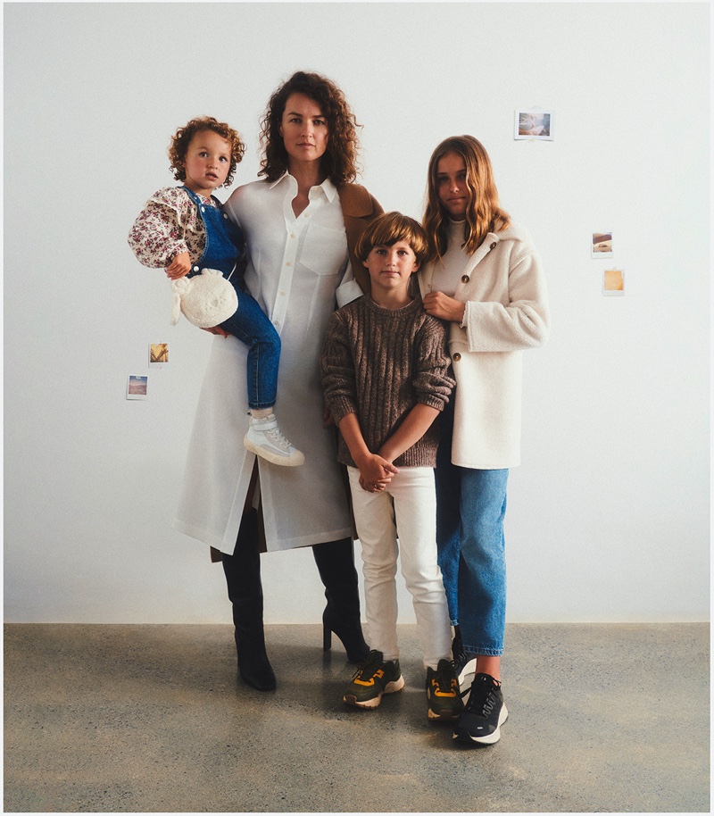 Caroline Barton poses with children Bronte, Carter, and Darcy for Mango This is Family fall-winter 2021 campaign.