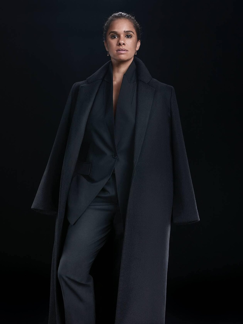 Dancer Misty Copeland poses in autumn outerwear for Theory fall 2021 campaign.