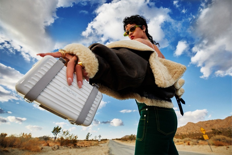 Posing in California, Rihanna fronts Rimowa Never Still 2021 campaign.