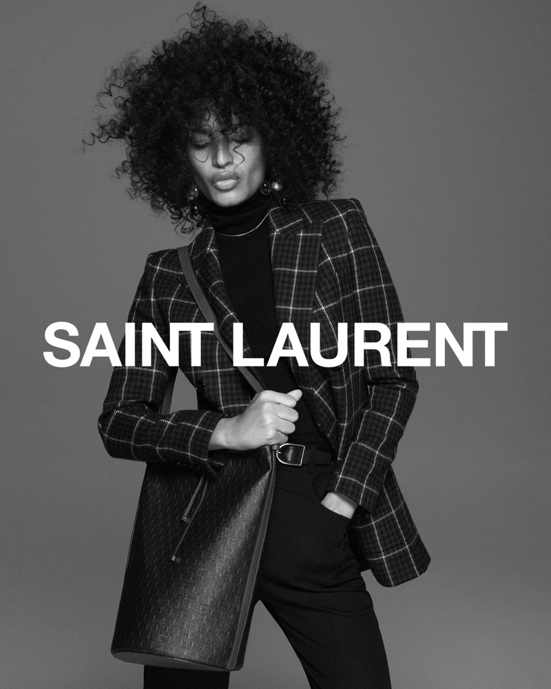 Actor Indya Moore poses for Saint Laurent fall 2021 campaign.