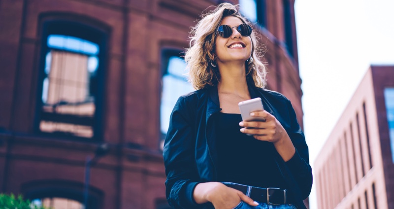 Smiling Woman Phone Outside Urban Area