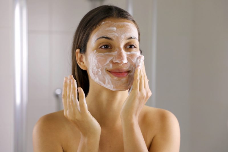 Woman Cleaning Face