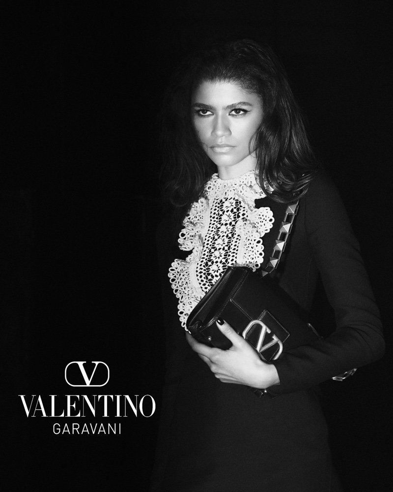 Zendaya poses with Valentino Garavani Stud Sign shoulder bag in Valentino fall-winter 2021 campaign.