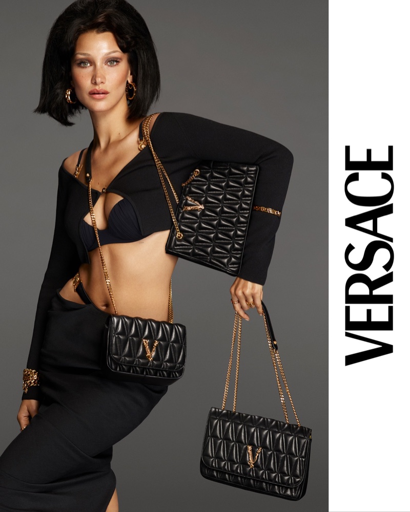 Showing off her midriff, Bella Hadid fronts Versace Virtus handbag 2021 campaign.