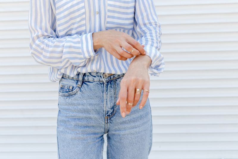 Closeup Woman Rings Jeans Striped Shirt