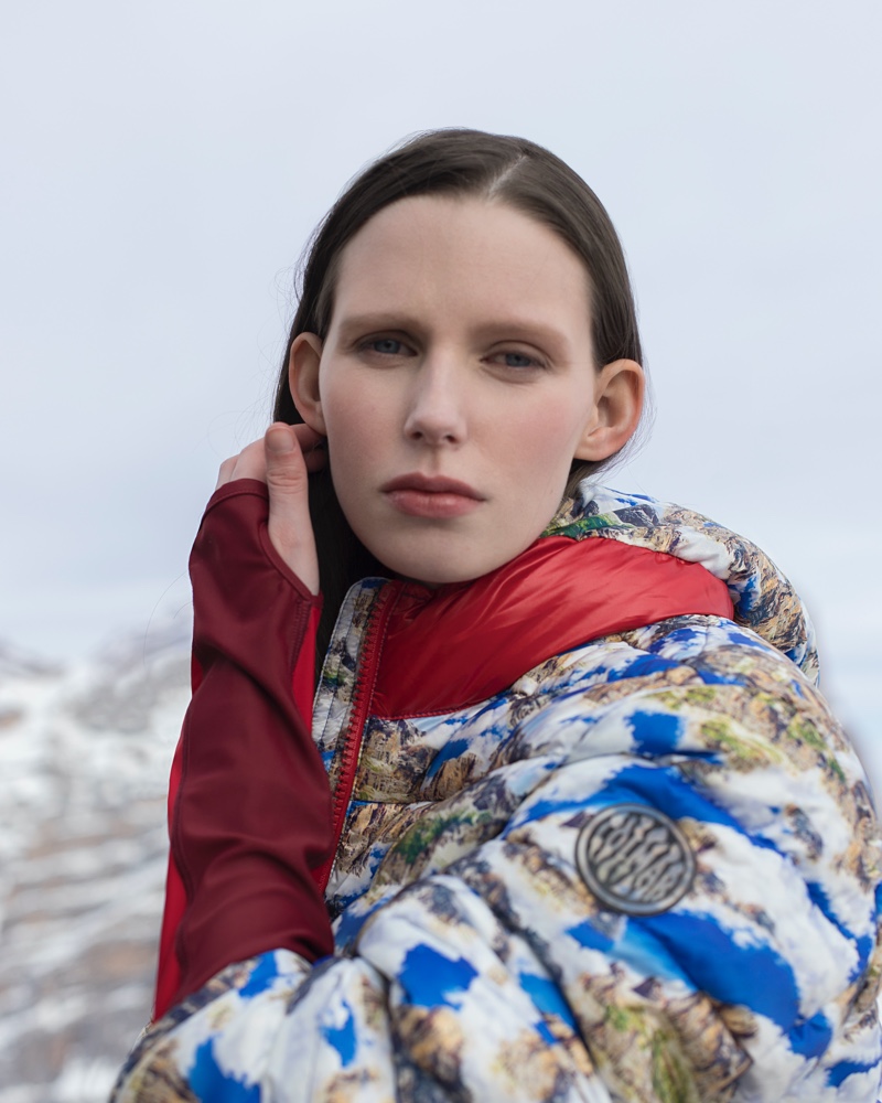 Making a graphic statement, Lina Simonsen wears a Colmar A.G.E. by Morteza Vaseghi printed hooded jacket.