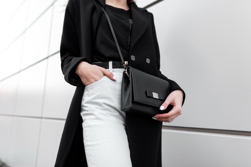 Cropped Woman Black Coat Shirt White Jeans Bag