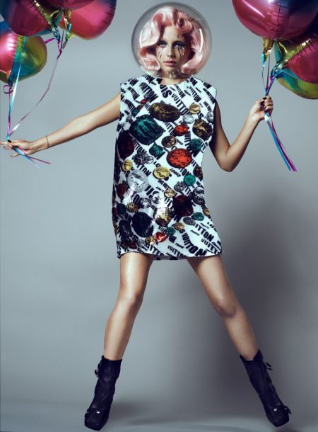 Emma Chamberlain Wears Louis Vuitton x Fornasetti for V Magazine Posing with balloons, Emma Chamberlain wears Louis Vuitton x Fornasetti jacket. Photo: Domen & Van de Velde / Courtesy of V Magazine