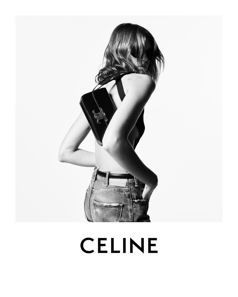 Model Kaia Gerber poses with Celine Triomphe shoulder bag for the brand's winter 2021 campaign.