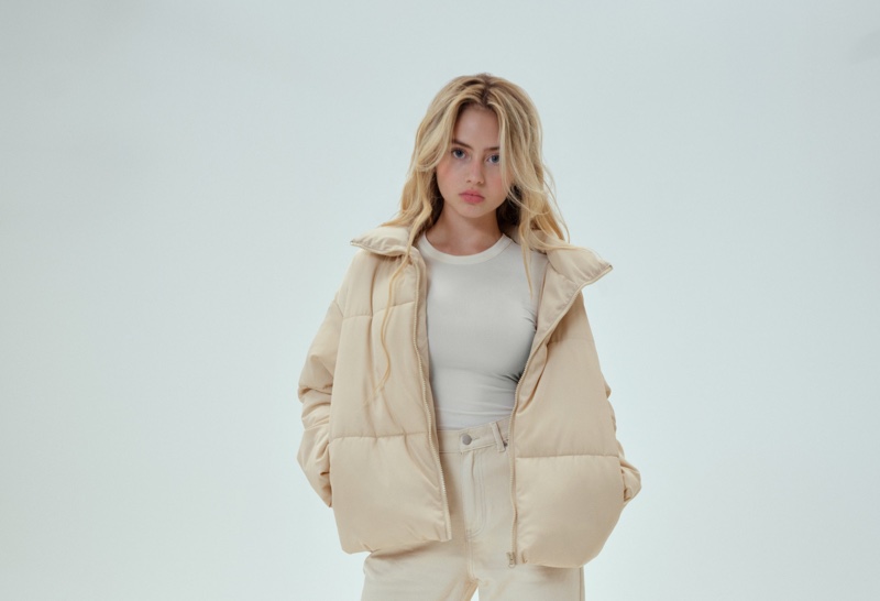 Model Leni Klum poses in puffer jacket from About You collaboration.