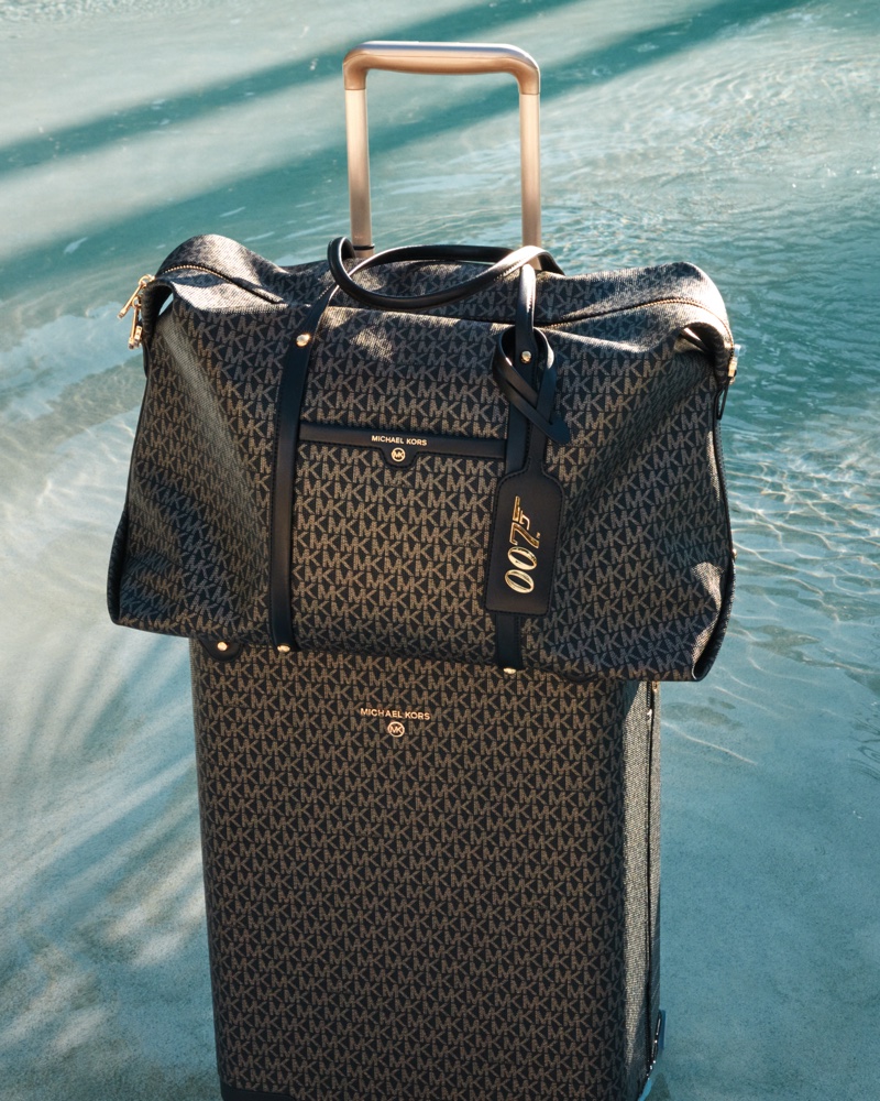 Beck Weekender bag and luggage from Michael Michael Kors x 007 collaboration.