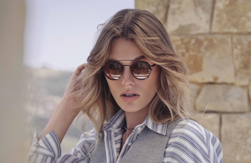 Madison Headrick poses for Brunello Cucinelli x Oliver Peoples eyewear campaign.