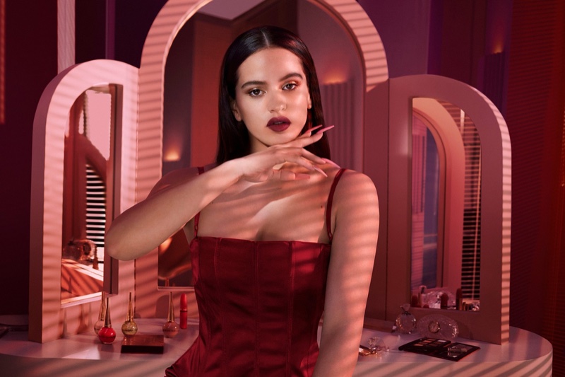 Dressed in red, Rosalia fronts MAC Cosmetics Aute Cuture campaign.