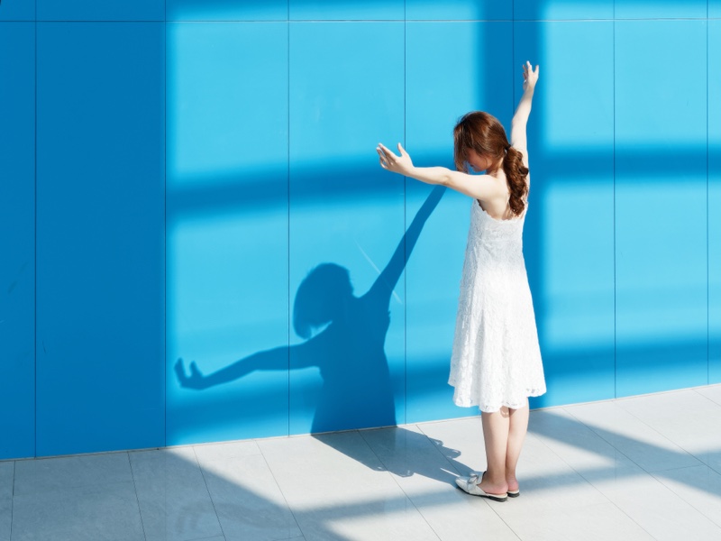 Stretching Shadow White Dress Woman