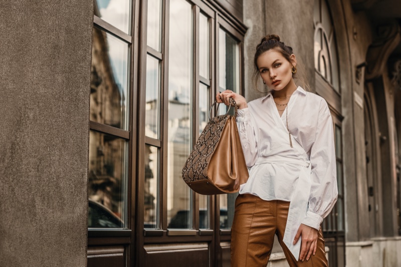 White Long Shirt Tied Brown Pants Python Print Bag Outfit