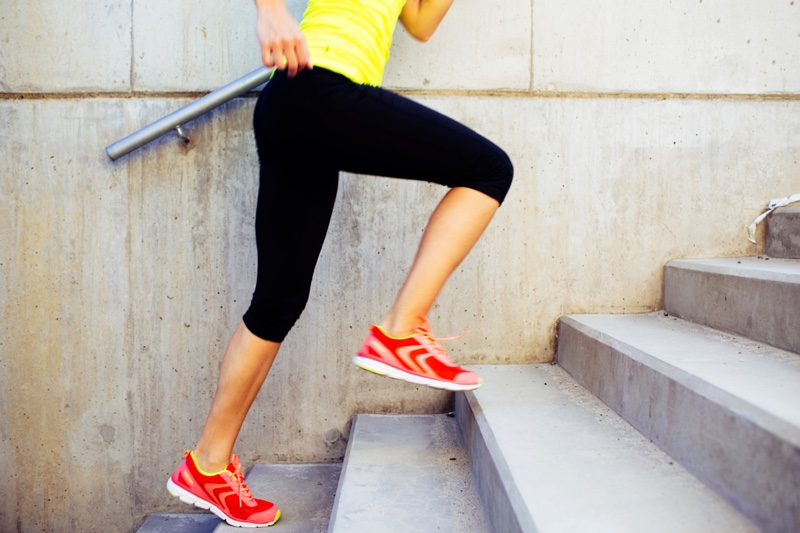 Woman Running Up Stairs Red Colorful Sneakers