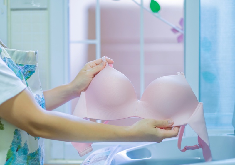 Woman Washing Pink Bra
