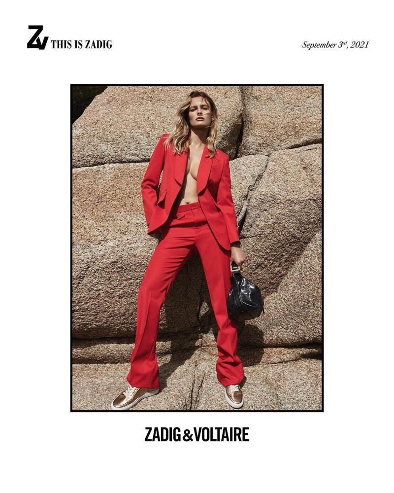 Edita Vilkeviciute models red pant suit in Zadig & Voltaire fall-winter 2021 campaign.