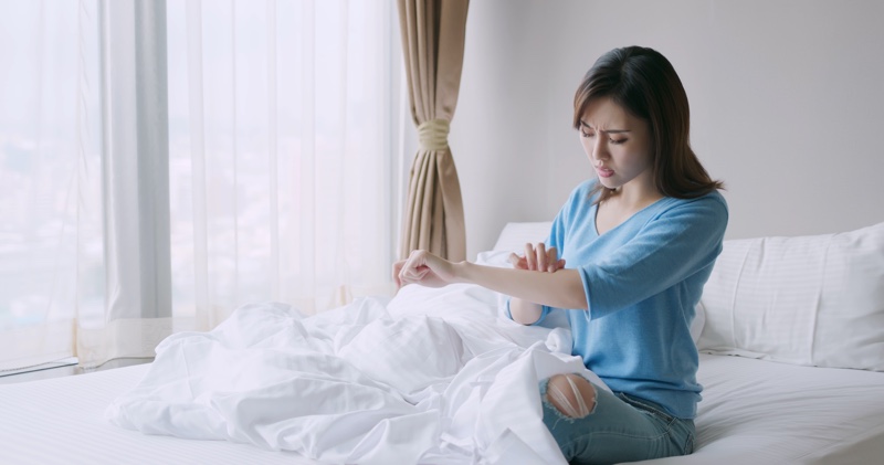 Asian Woman Checking Skin Arm