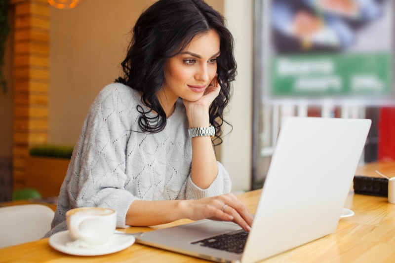 Attractive Woman Looking Laptop